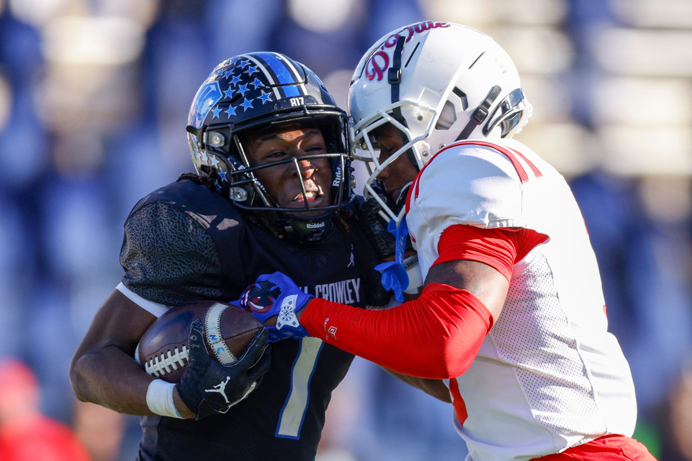 Duncanville defensive back Javion Holiday (3) tackles North Crowley running back Cornelius...