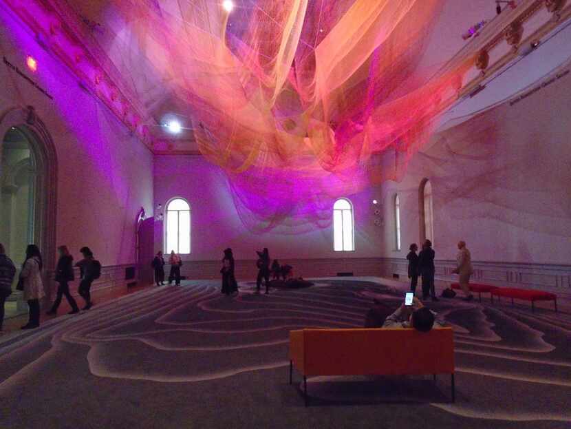 The changing  patterns of color, light and shadow in Janet Echelman’s  1.8  invite viewers...