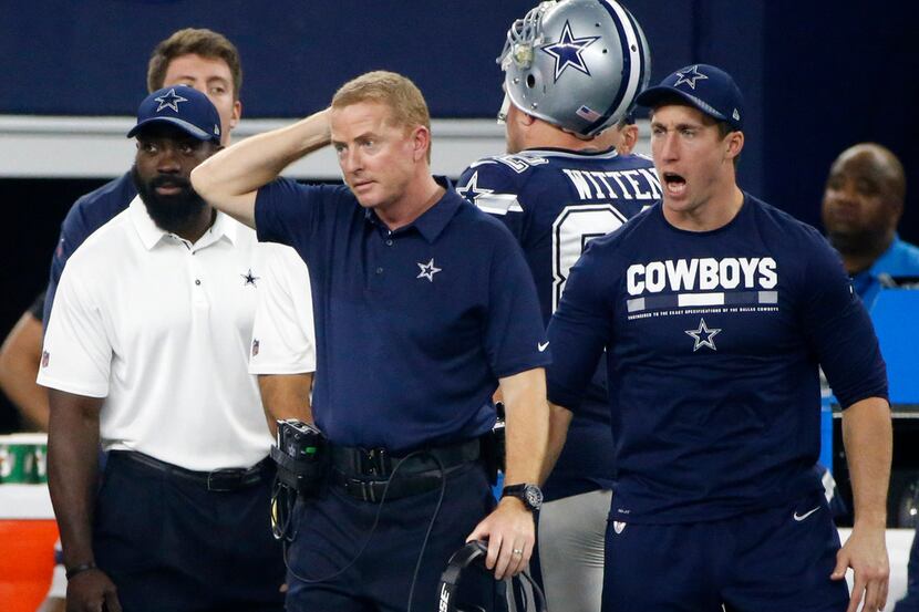 Dallas Cowboys head coach Jason Garrett, left, and linebacker Sean Lee, right, who is...