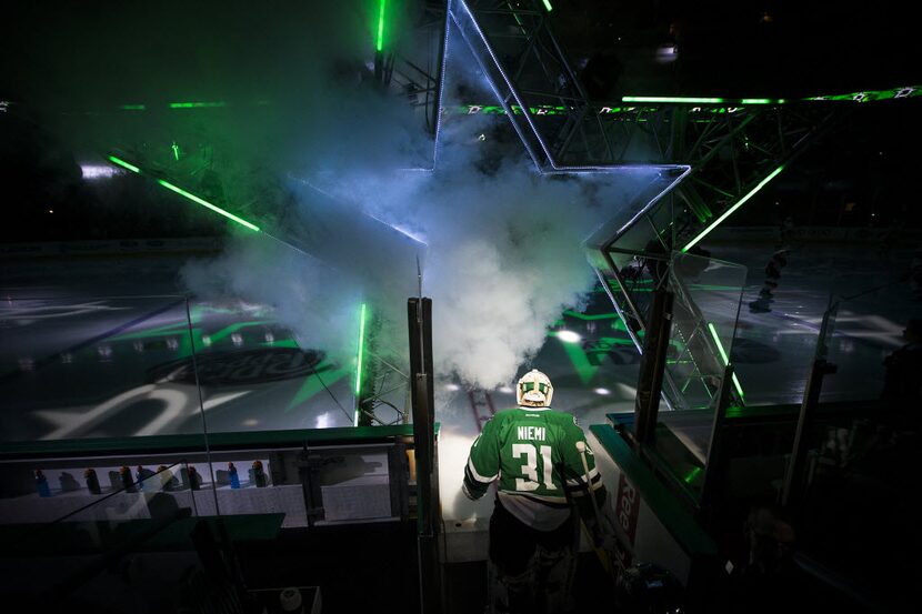 Dallas Stars goalie Antti Niemi (31) leads the team to the ice before facing the Calgary...