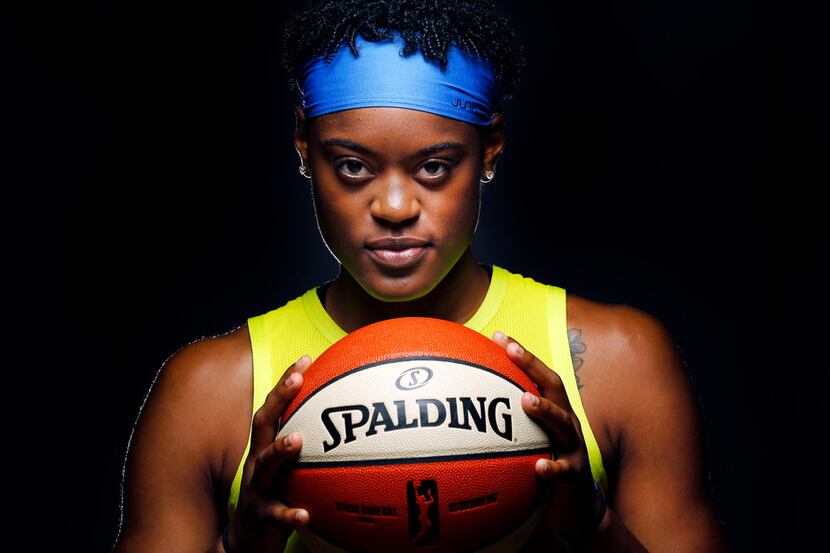 Dallas Wings basketball player Kaela Davis (3) poses for a photo during media day at College...