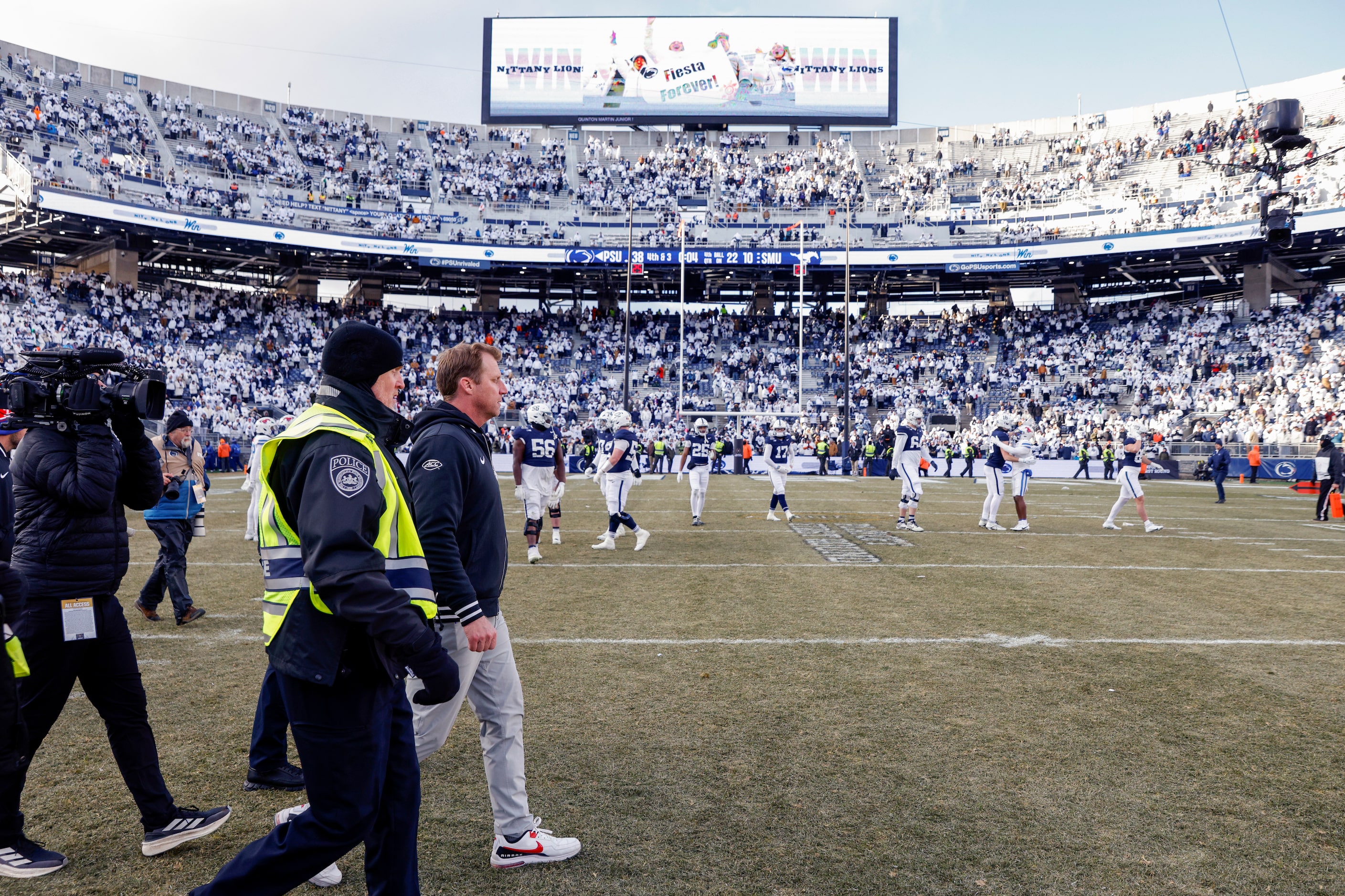 SMU head coach Rhett Lashlee walks on the field after losing in the first round of the NCAA...