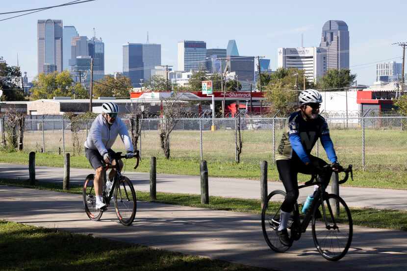 Cyclists on the southern end of the Santa Fe Trail on Sunday as they head away from downtown...