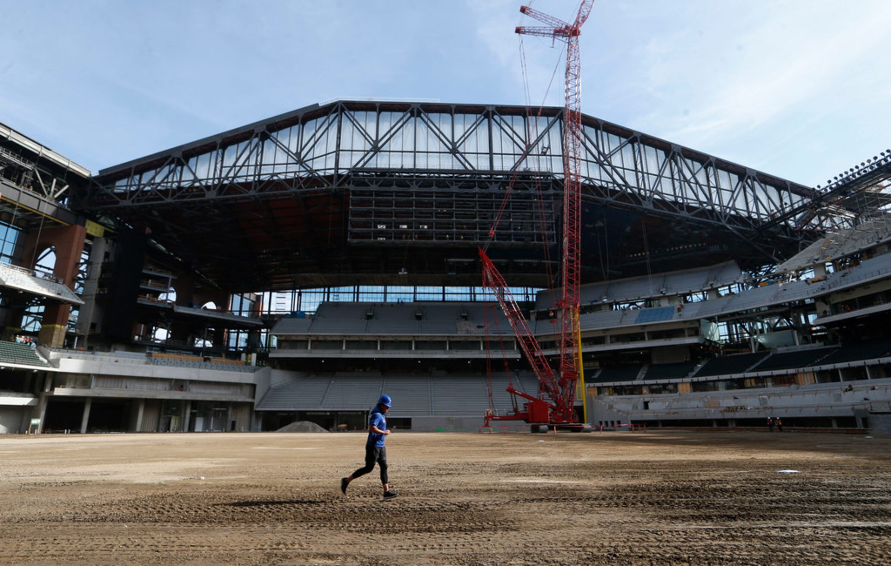 Texas Rangers Alex Burg runs on the field at Globe Life Field in Arlington, Texas on...