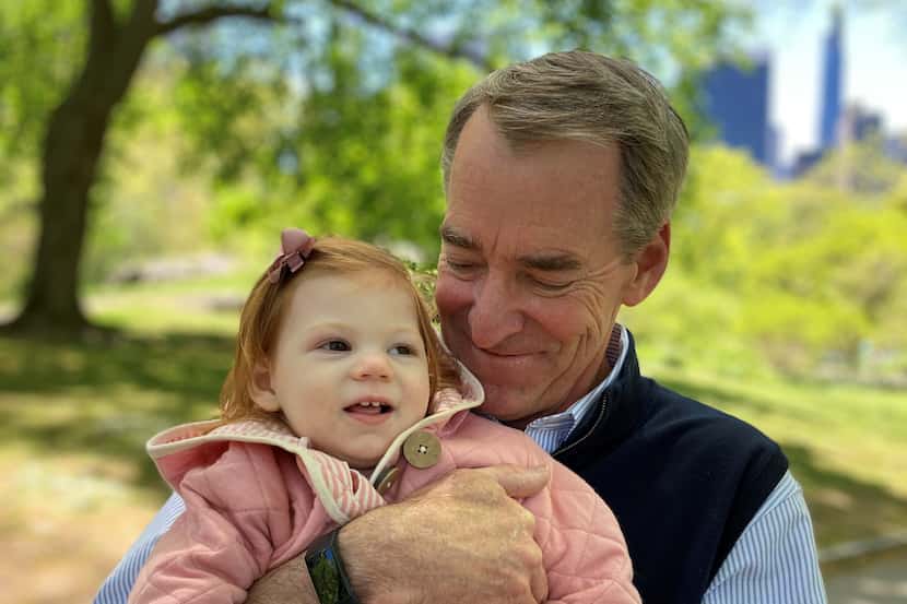 Former AMR Corp. CEO Tom Horton with his granddaughter, Gianna Horton, who has a rare...