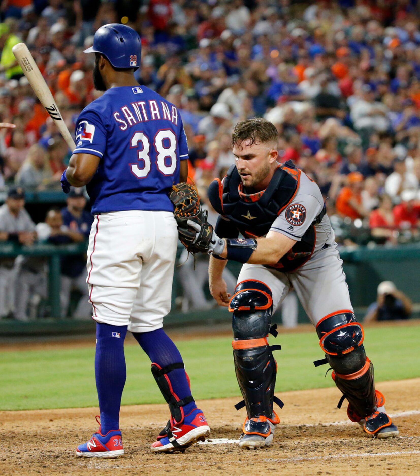 Texas Rangers second baseman Danny Santana (38) is tagged by Houston Astros catcher Max...