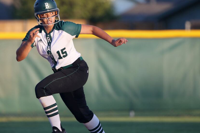 Berkner catcher Riley Cantrell (15) scores a run to make the score 7-0 in the second inning...