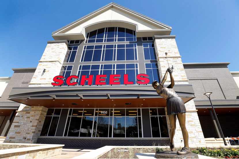 The massive Scheels sporting goods store at the Grandscape retail development in The Colony,...