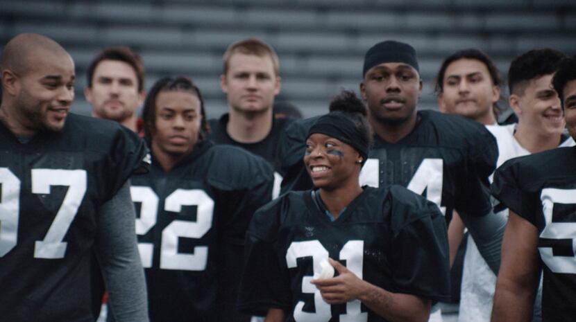  Toyota's ad features Antoinette Antoinette "Toni" Harris, a female football player at a...