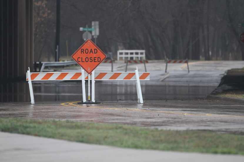 Park View Avenue closed underneath Central Expressway in McKinney as water from Wilson Creek...