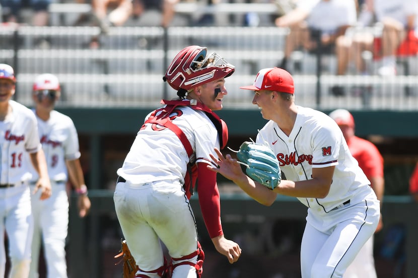 Orchard Lake St. Mary's  catcher Ike Irish, left, and pitcher Brock Porter, right, Friday,...