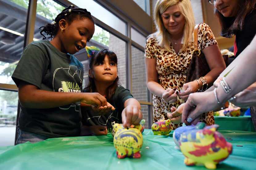 Kristin Strickland (2nd from right), principal at Arapaho Classical Magnet School in...