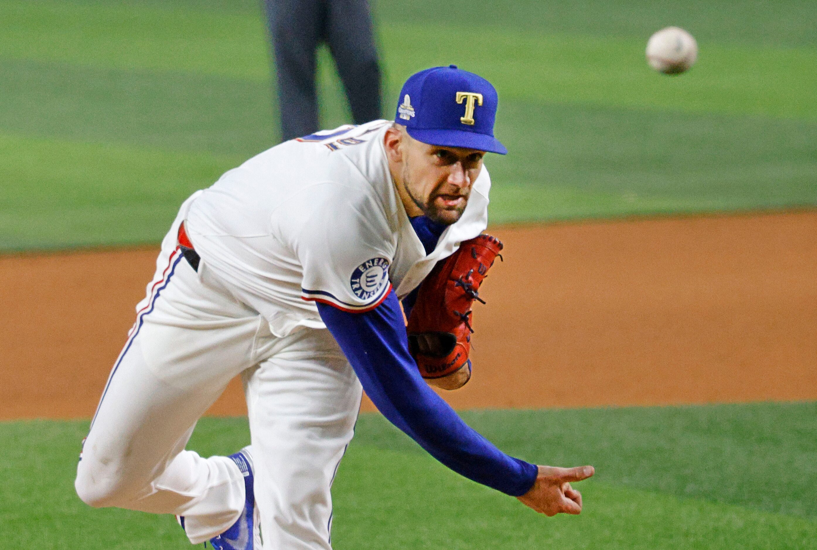 Texas Rangers starting pitcher Nathan Eovaldi (17) delivers during the fourth inning of an...