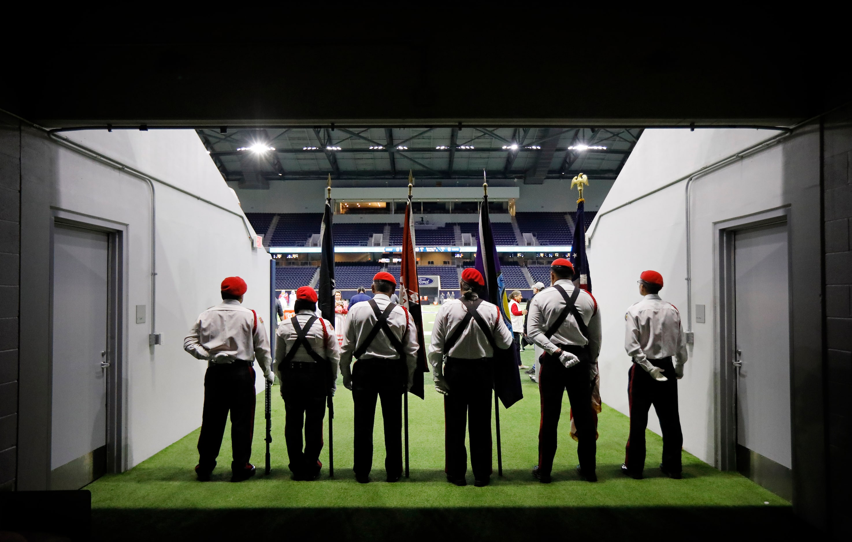 The Choctaw Nation Honor Guard from Durant, OK wait to take field for the national anthem...