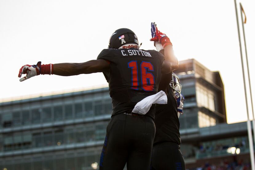 Southern Methodist Mustangs wide receiver Courtland Sutton (16) celebrates with running back...