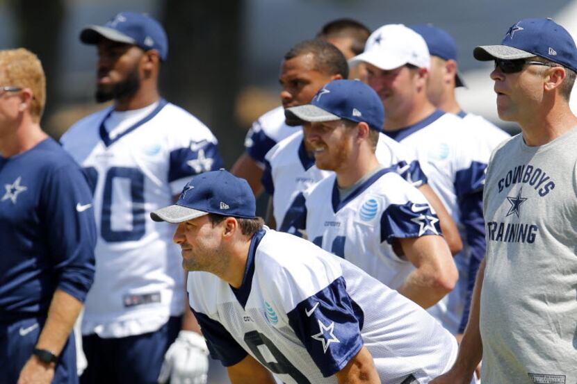 Dallas Cowboys quarterback Tony Romo (9) watches the morning walk-thru as he isn't...