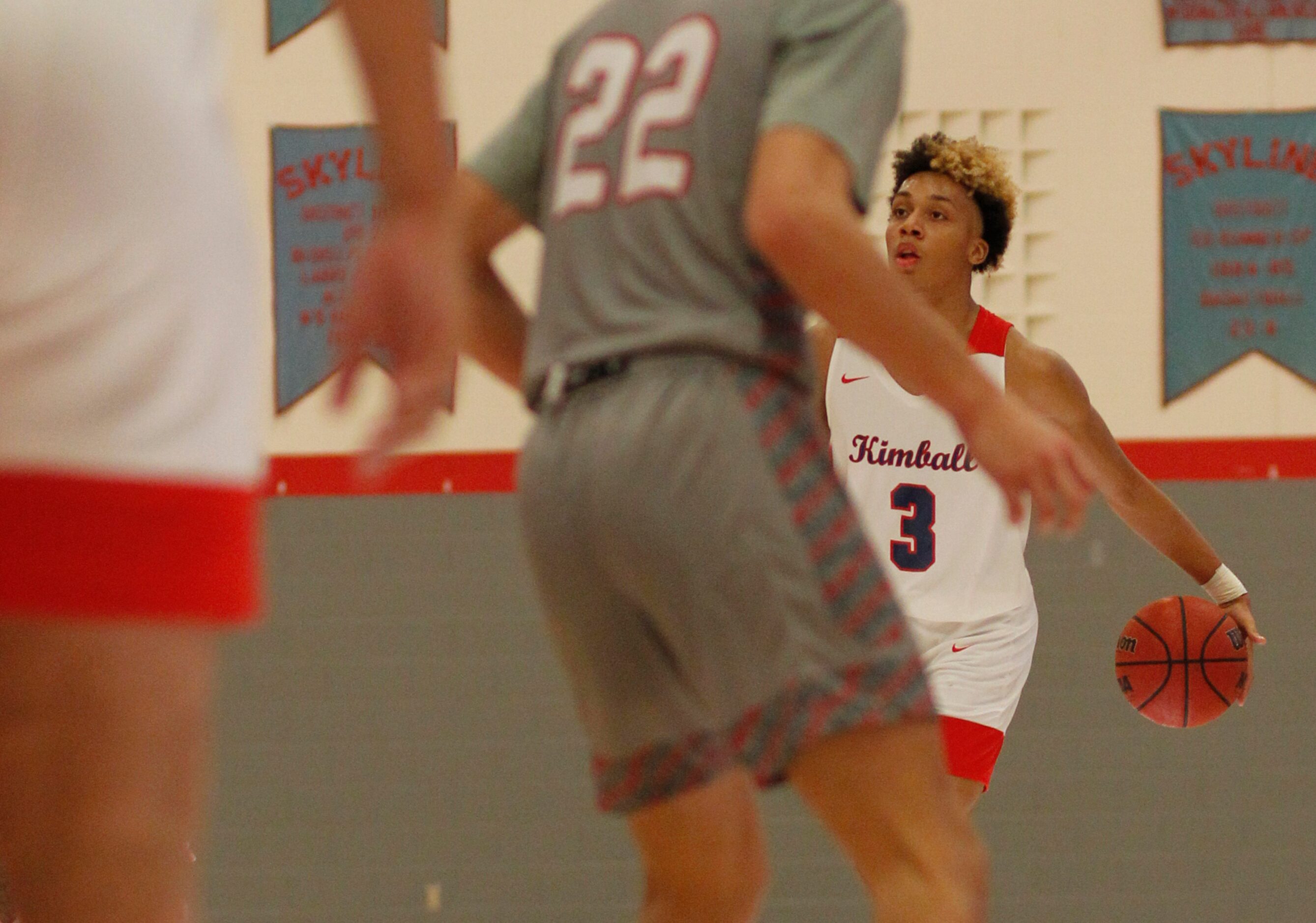 Dallas Kimball guard Chauncey Gibson (3) surveys the Dallas Woodrow Wilson defensive set...