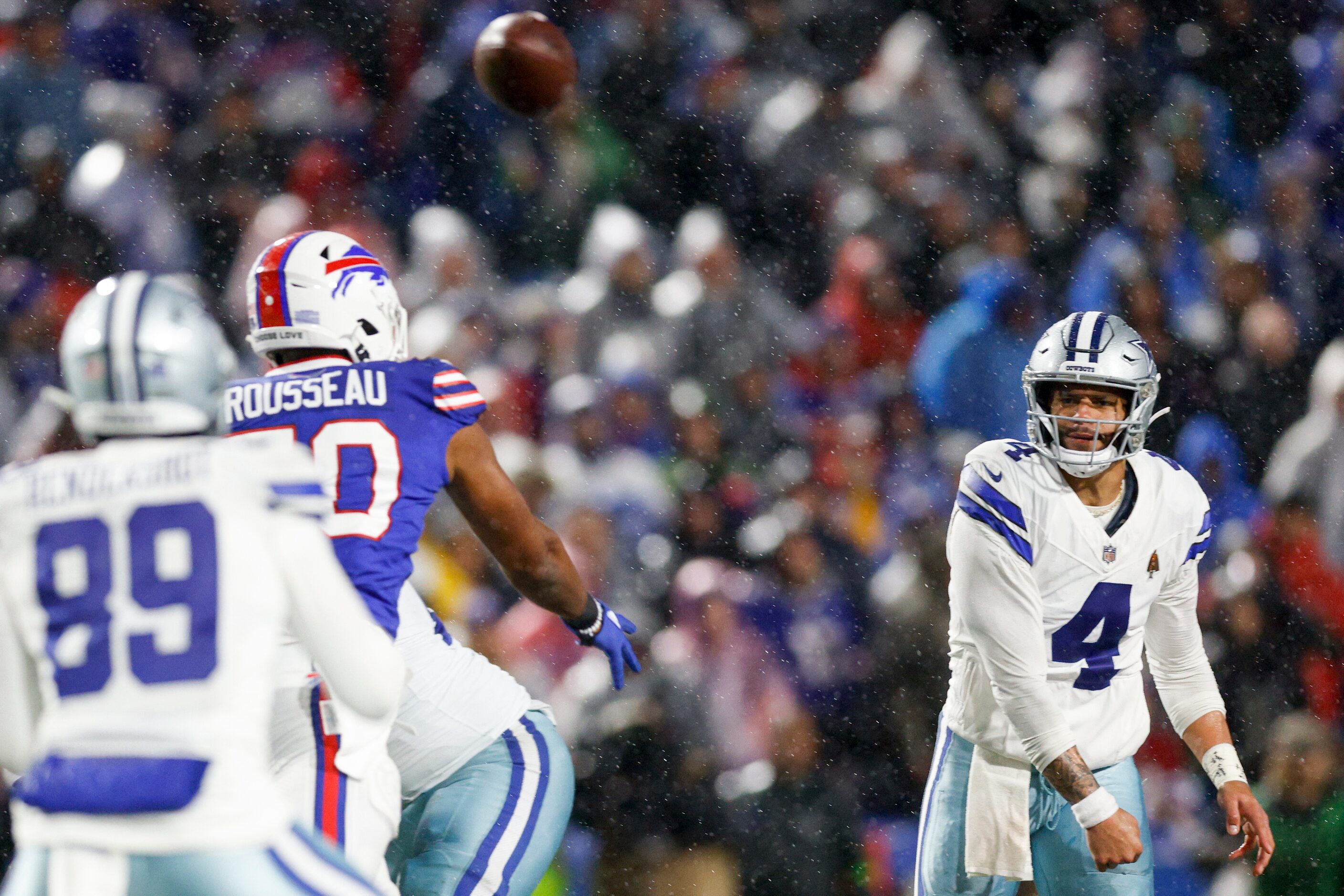 Dallas Cowboys quarterback Dak Prescott (4) throws a pass to tight end Peyton Hendershot...