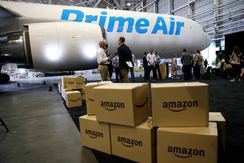 FILE - In this Thursday, Aug. 4, 2016, file photo, Amazon.com boxes are shown stacked near a...