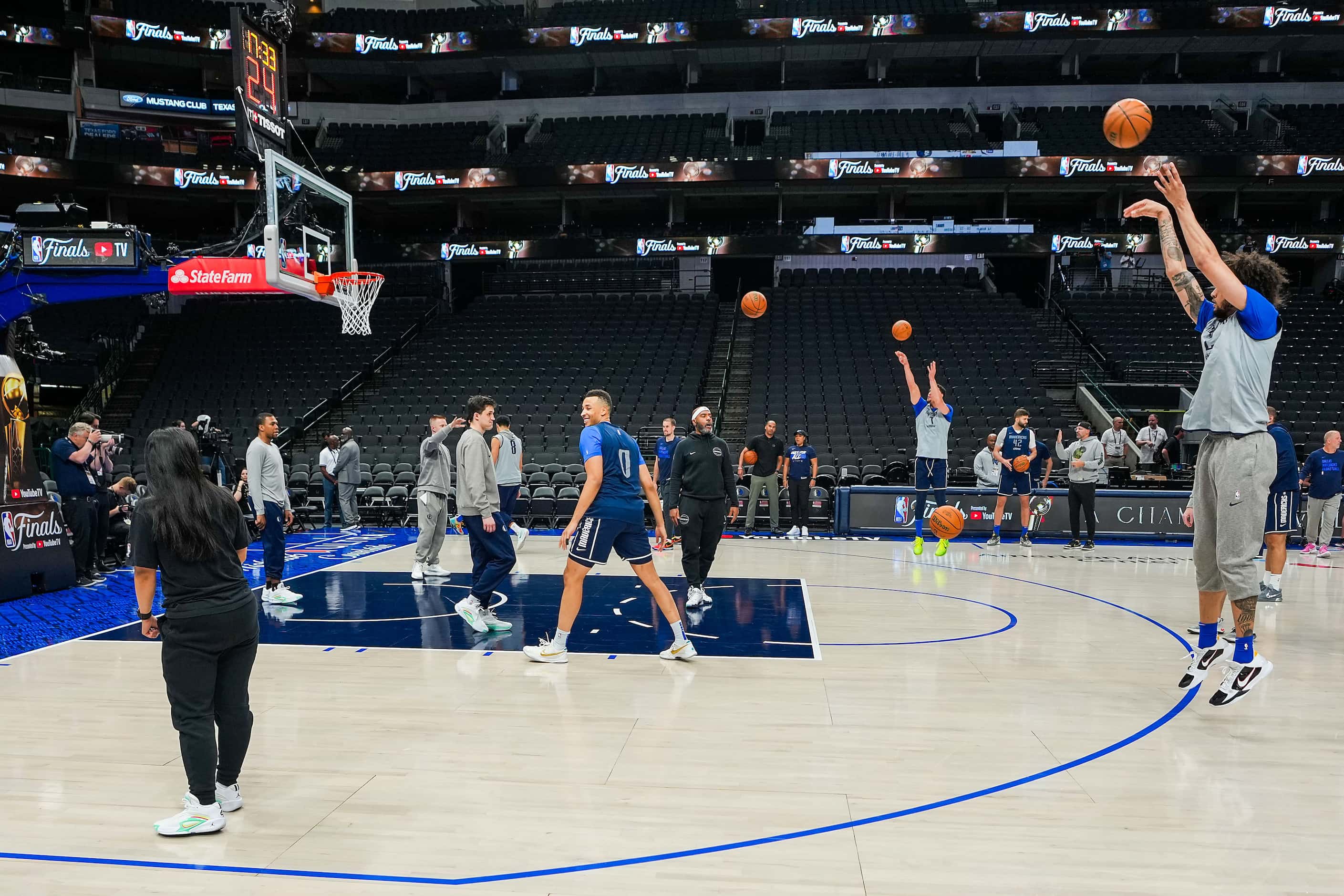 Dallas Mavericks center Dereck Lively II shoots a 3-pointer during practice in preparation...