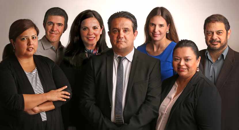 Alfredo Carbajal (center) leads the Al Dia staff (from left): Lorena Flores, Juan Jaramillo,...
