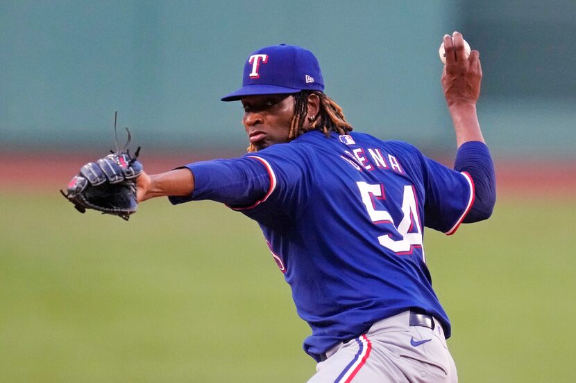 Texas Rangers pitcher Jose Urena delivers during the first inning of a baseball game against...