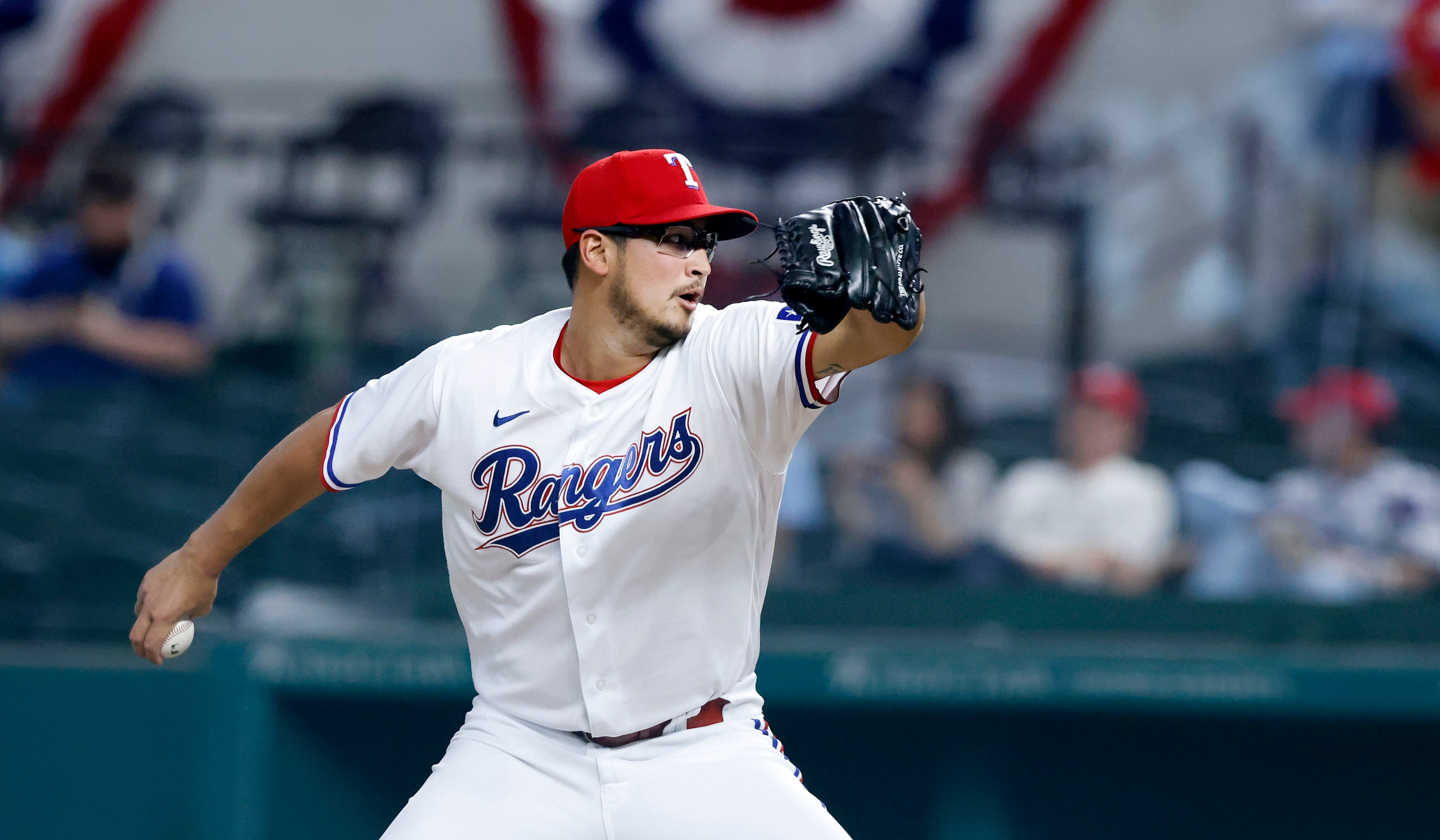 Texas Rangers starting pitcher Dane Dunning (33) throws against the Toronto Blue Jays during...