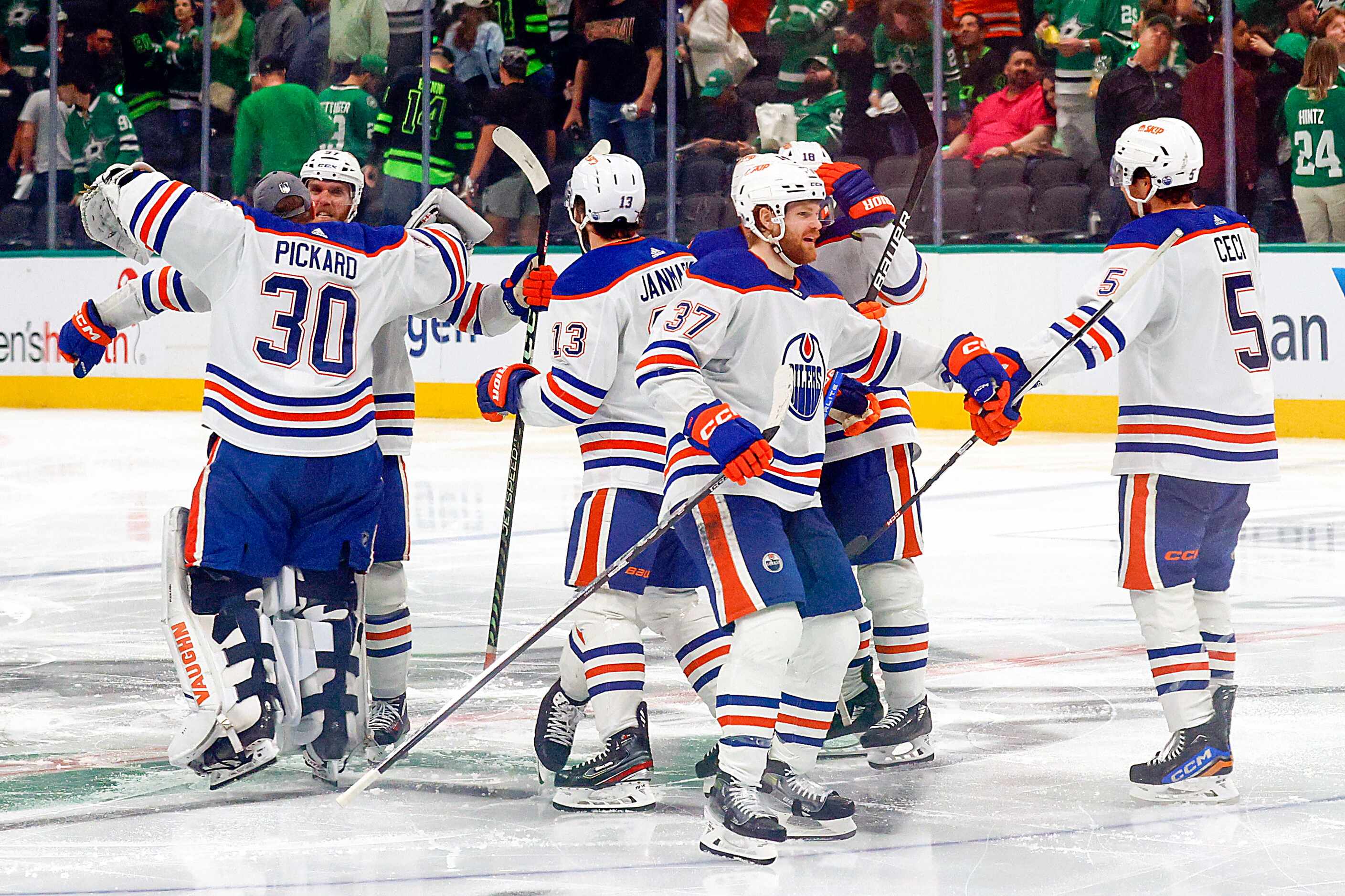 The Edmonton Oilers celebrate after winning Game 1 of the NHL hockey Western Conference...