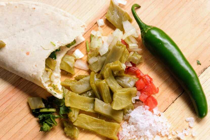 Graphic representation of meal preparation of Mexican Recipe "Nopales" or "Nopalitos" being...