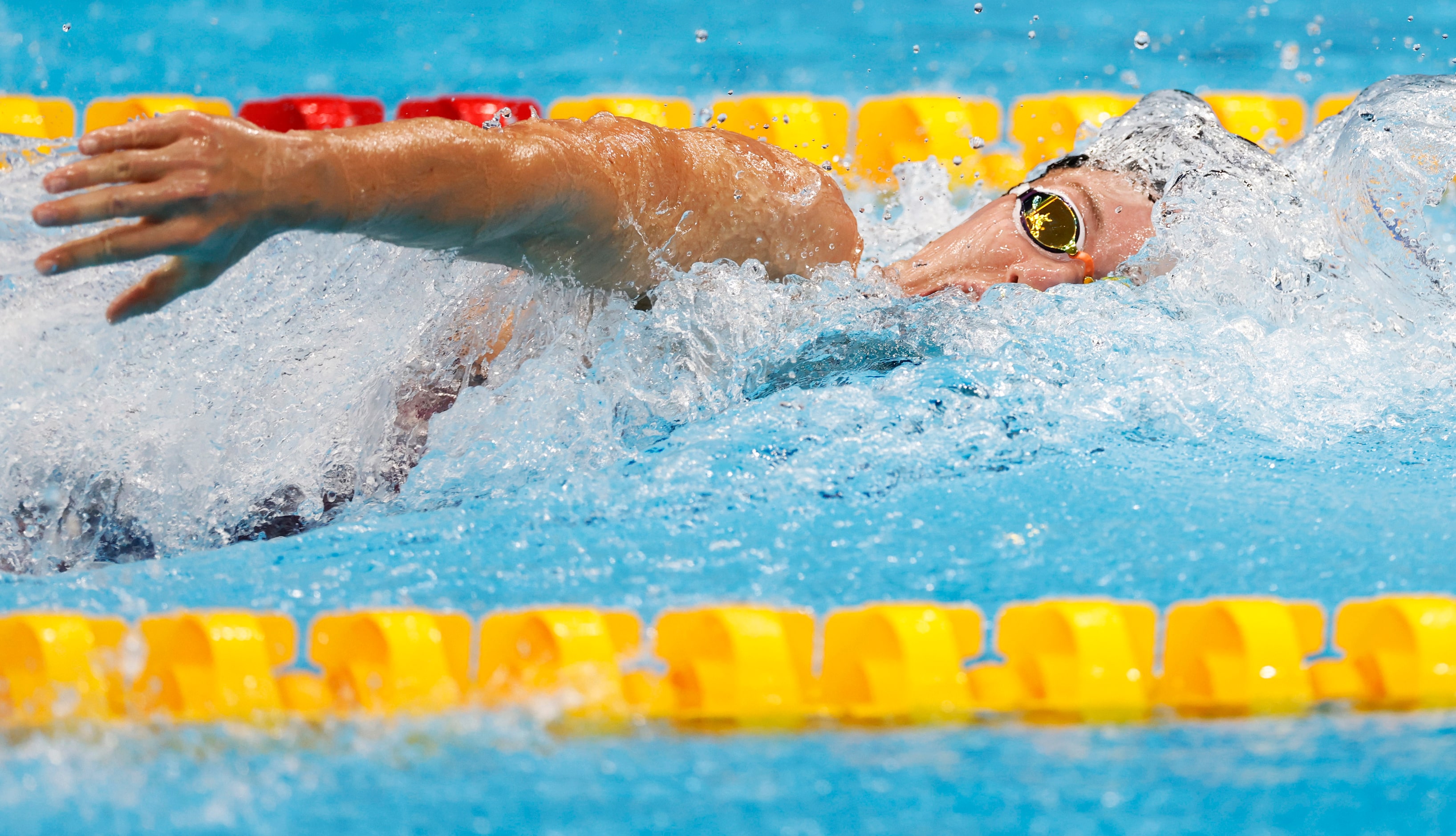 USA’s Abbey Weitzeil competes in the women’s 4x100 medley relay during the postponed 2020...