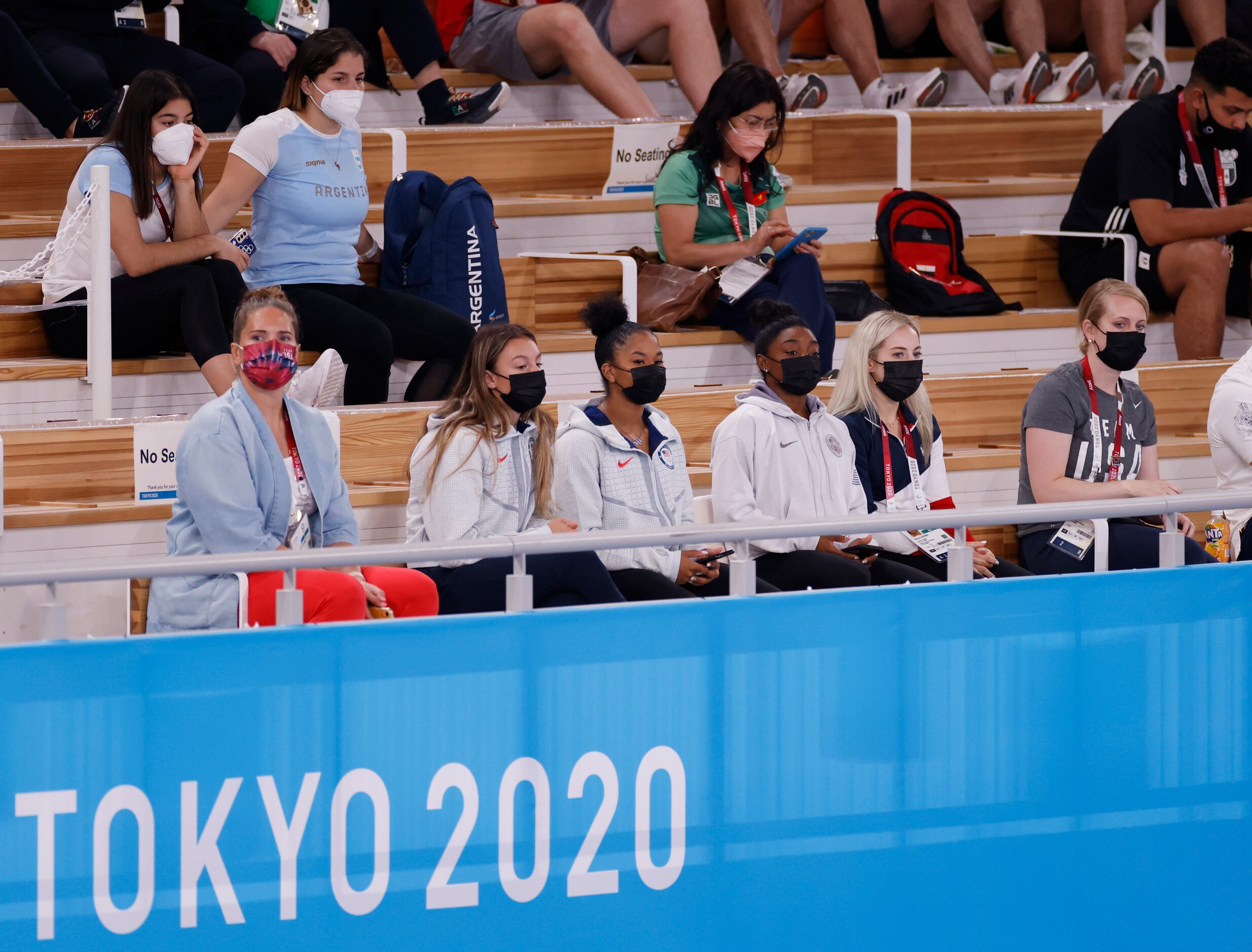 (From l to r) USA’s Grace McCallum, Jordan Chiles, Simone Biles, and MyKayla Skinner watch...