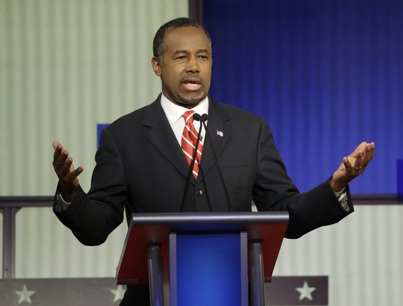 Ben Carson makes a point during a Republican presidential primary debate, Thursday, Jan. 28,...