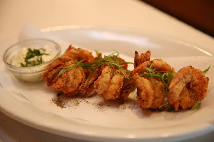 Salt-and-pepper shrimp with pesto aioli at Paul Martin's American Grill