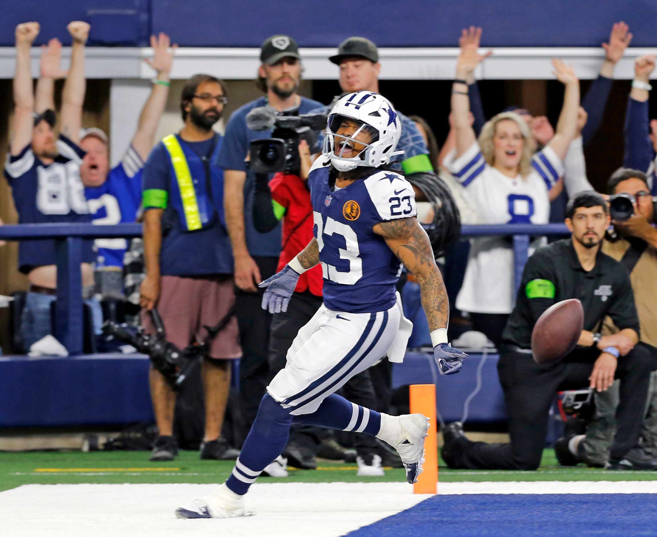 Dallas Cowboys running back Rico Dowdle (23) celebrates his touchdown during the first half...