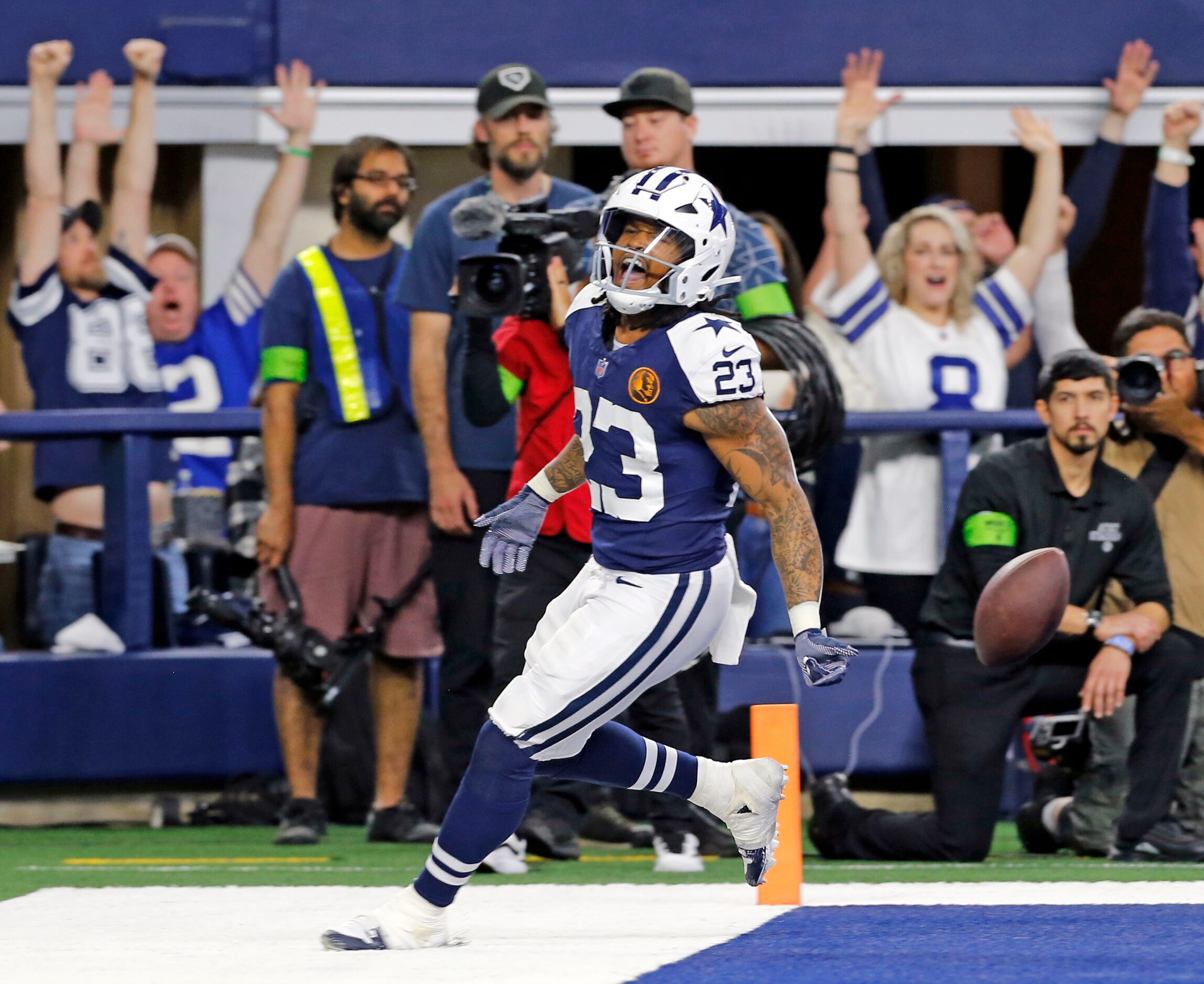 Dallas Cowboys running back Rico Dowdle (23) celebrates his touchdown during the first half...