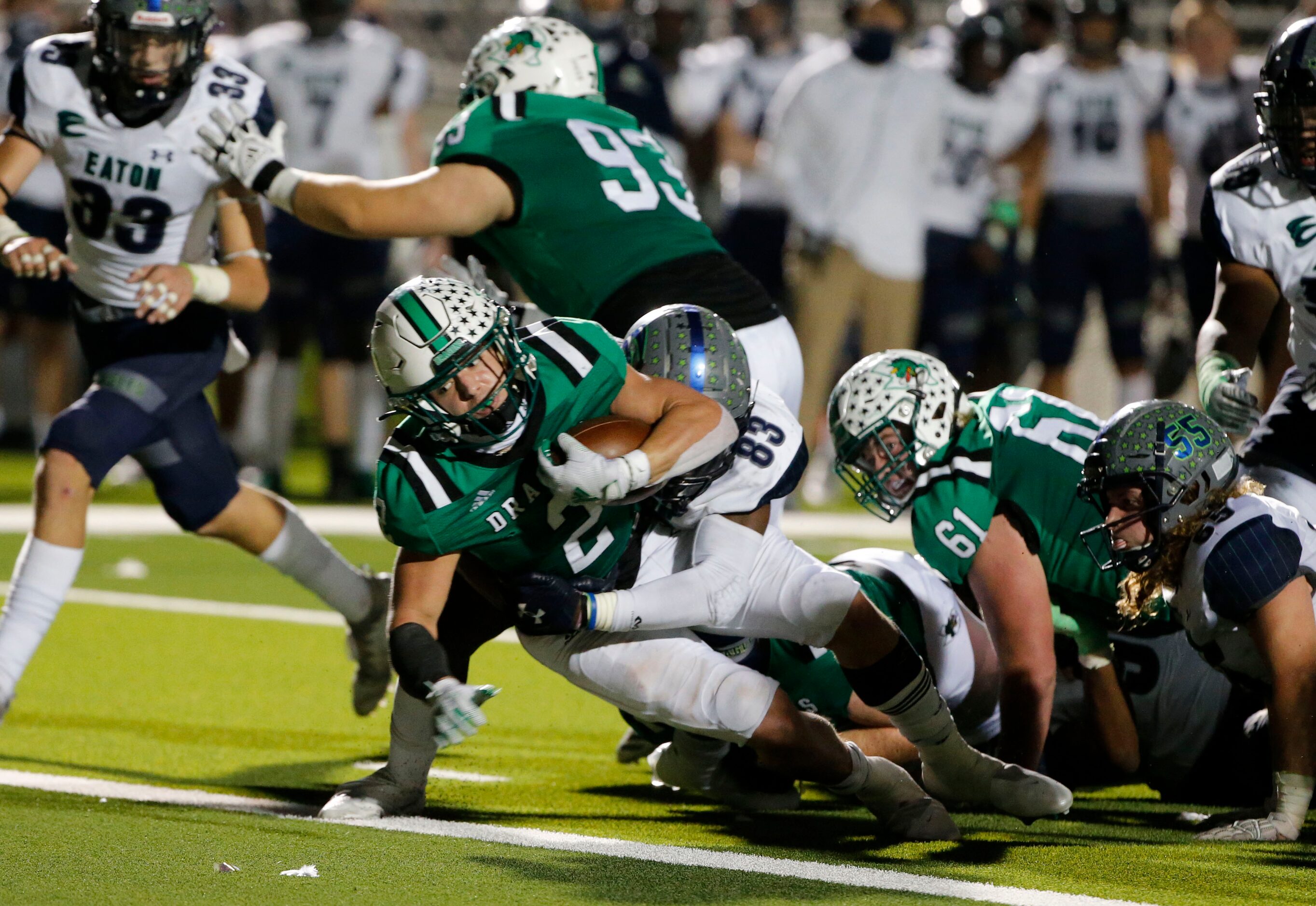 Southlake’s Owen Allen (2) scores a rushing touchdown against Eaton during their high school...