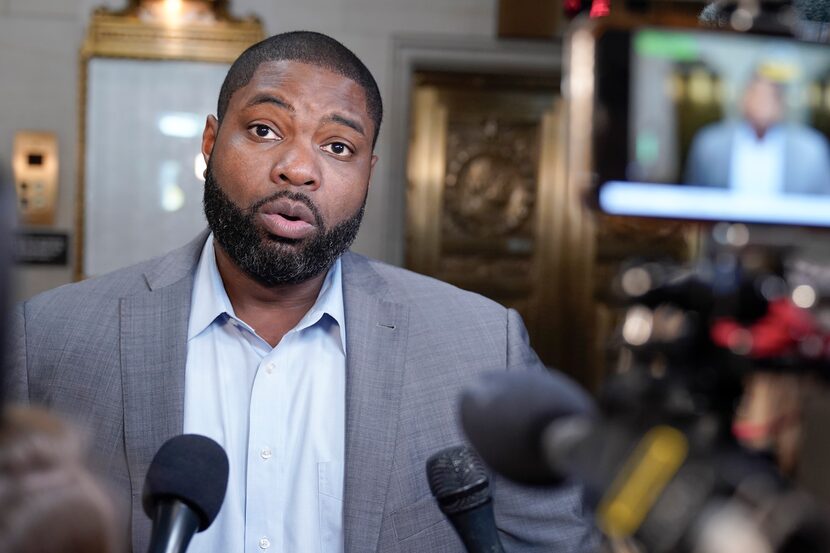 Rep. Byron Donalds, R-Fla., talks with reporters as House Republicans hold a caucus meeting...