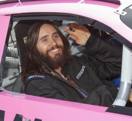 Jared Leto is all smiles after completing several laps around the track at Texas Motor...
