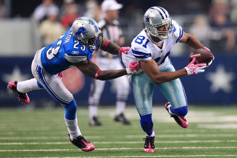 In only his second game as a Cowboy, Laurent Robinson had seven catches for a career-high...