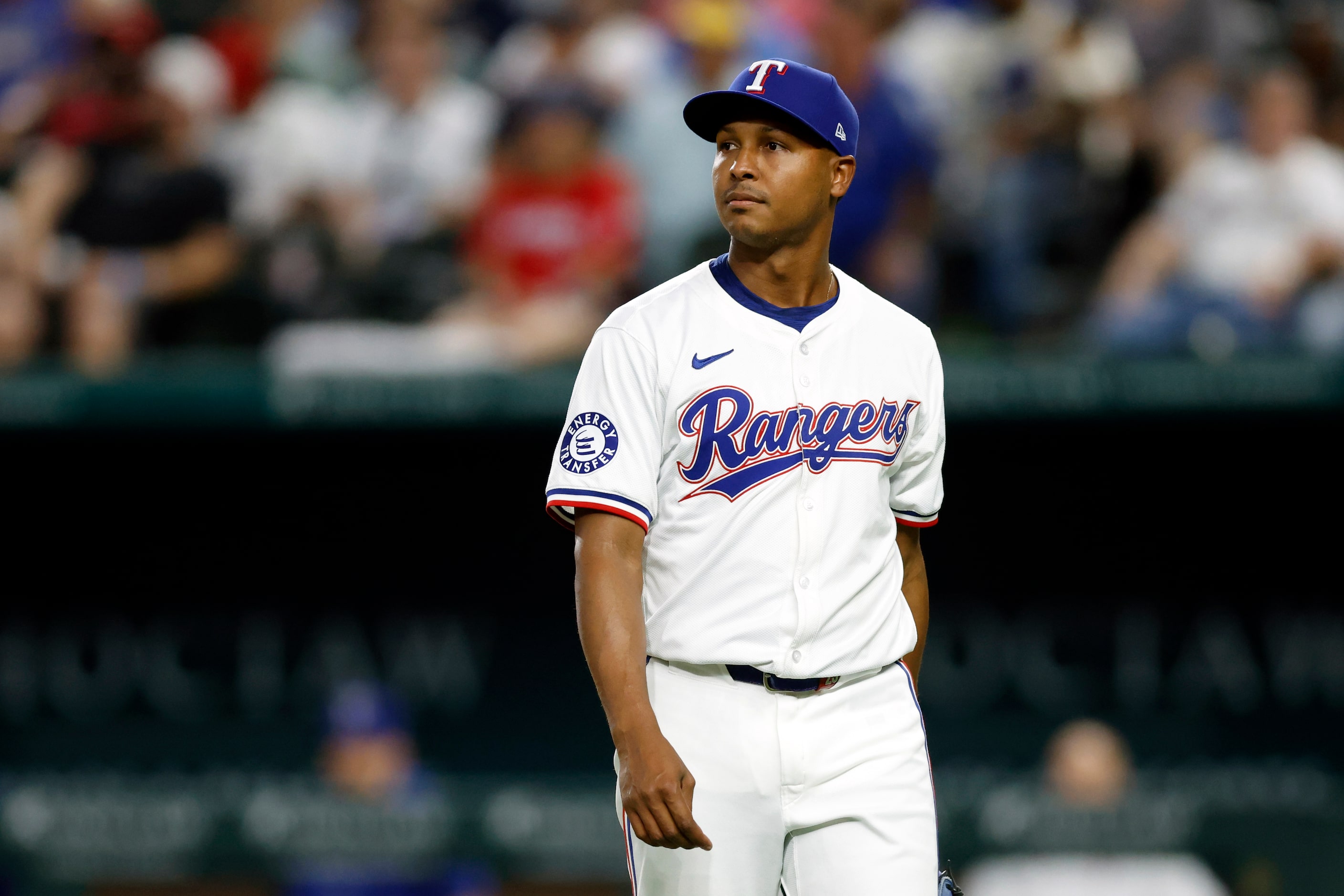 Texas Rangers relief pitcher Jose Leclerc (25) watches a replay after giving up a run during...