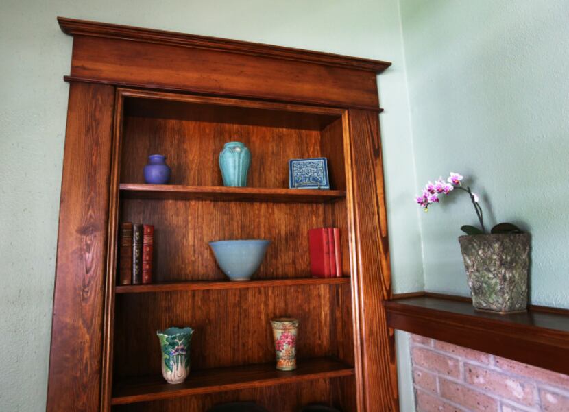 A book case in the living room of Jackie and Doug Sweat's home on Junius Street in Munger...