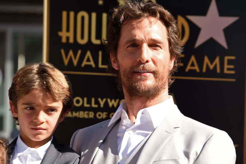 Actor Matthew McConaughey, standing with his son Levi Alves McConaughey, was honored with...