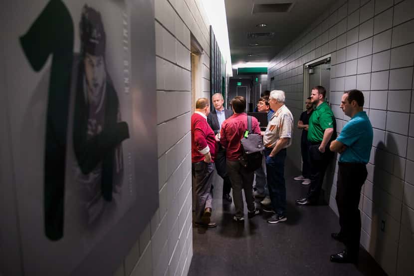 Dallas Stars General Manager Jim Nill answers questions from reporters after he announced in...