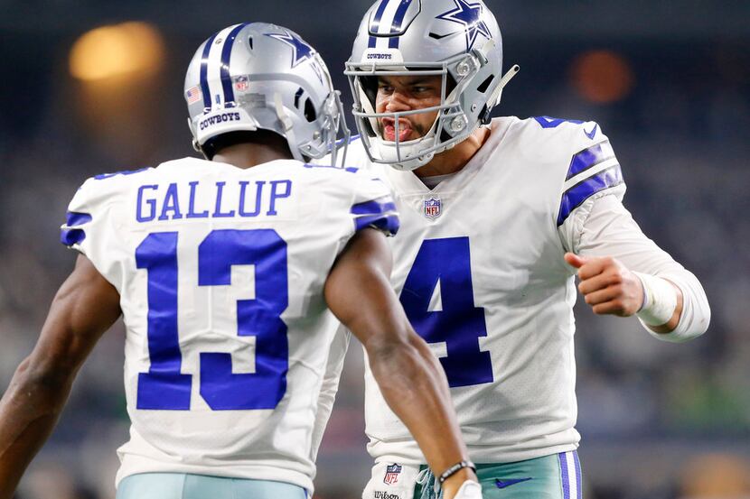 Dallas Cowboys wide receiver Michael Gallup (13) is congratulated on his second quarter...