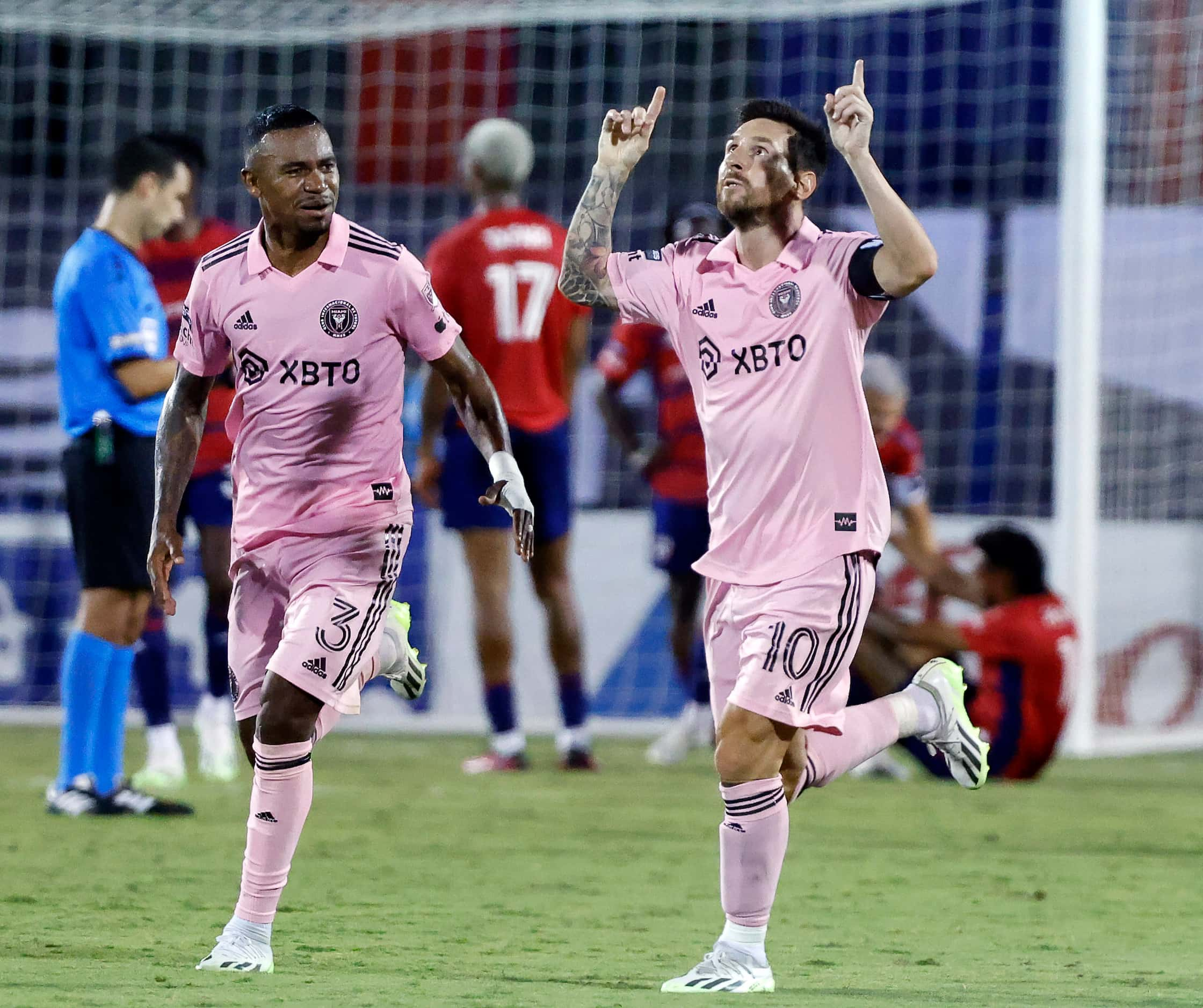 Inter Miami midfielder Dixon Arroyo (3) congratulates forward Lionel Messi (10) after he...