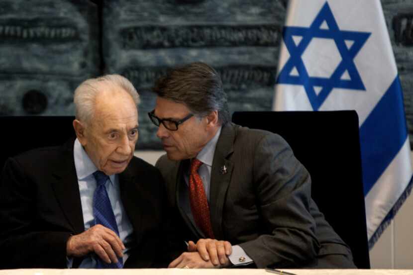 Israeli President Shimon Peres and Texas Gov. Rick Perry made a joint appearance at a...
