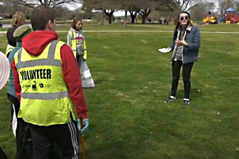 Volunteers in Plano band together to pick up trash near a city park.