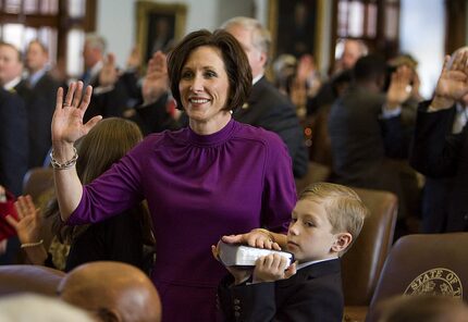 Sen. Lois Kolkhorst, R- Brenham, shown taking the oath of office on Tuesday, Jan. 11, 2011....