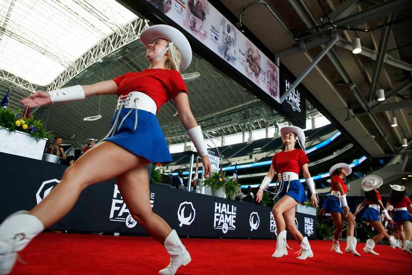 The Kilgore College Rangerettes perform during an enshrinement ceremony into the Cotton Bowl...