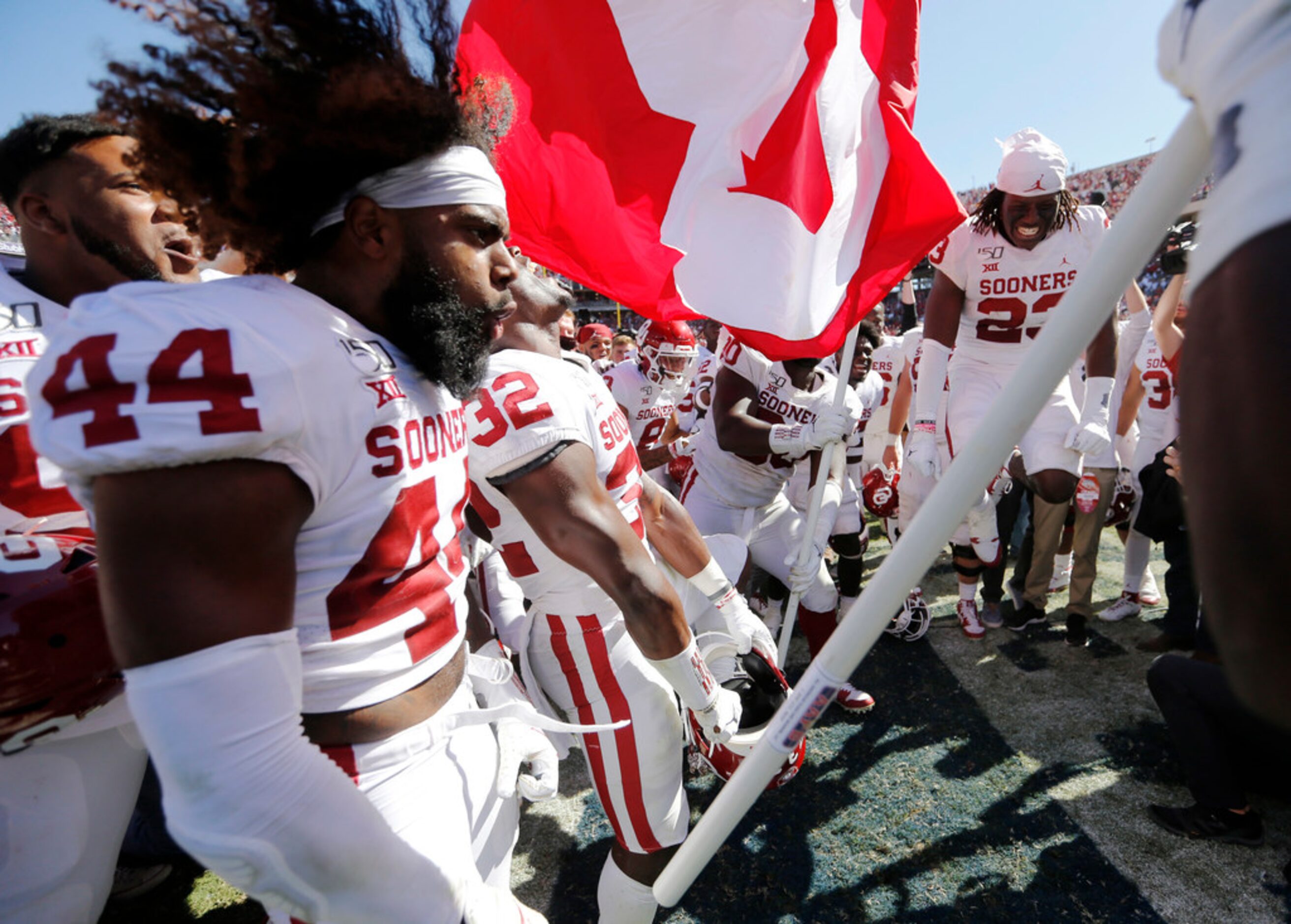 Oklahoma Sooners defensive back Brendan Radley-Hiles (44) and teammates celebrate as...